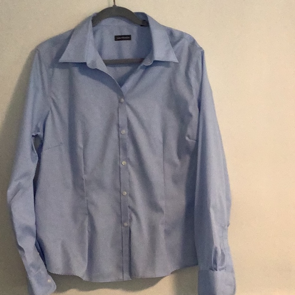 Men-s light blue Van Huesan dress shirt.